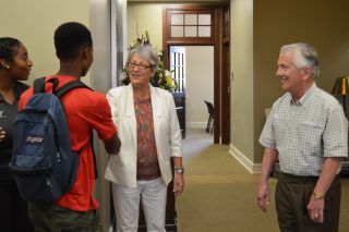 Student is warmly greeted by Assistant Dean Maribeth Lynes