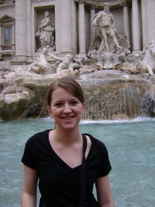 Female student in front of the Trevi Fountain in Rome.