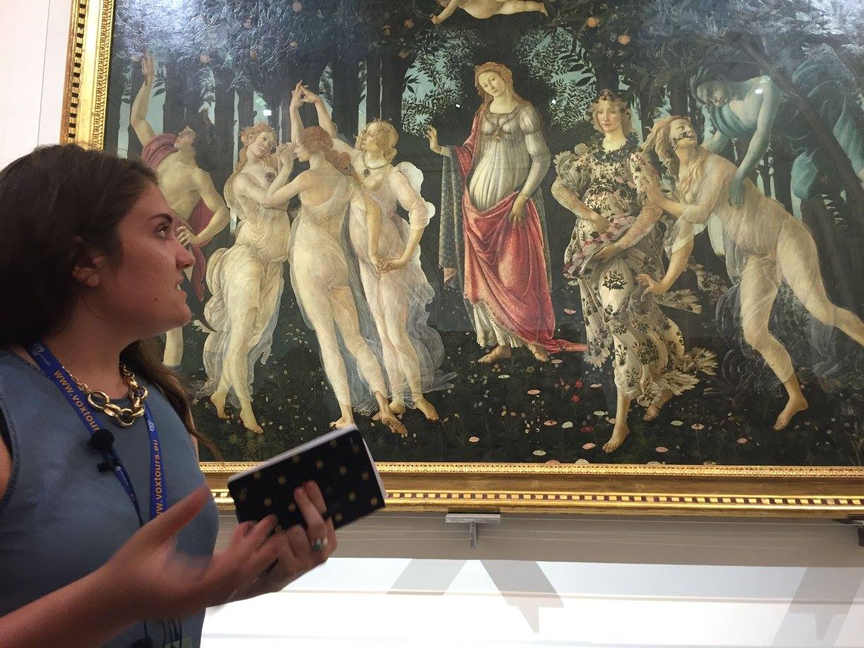 A female student discusses Botticelli's Primavera.